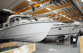 nimbus boat in a large warehouse