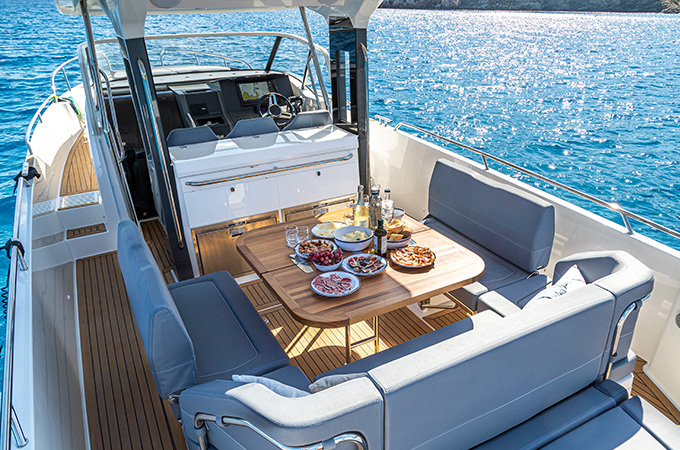 A breakfasttable on a boat on crystal blue sea